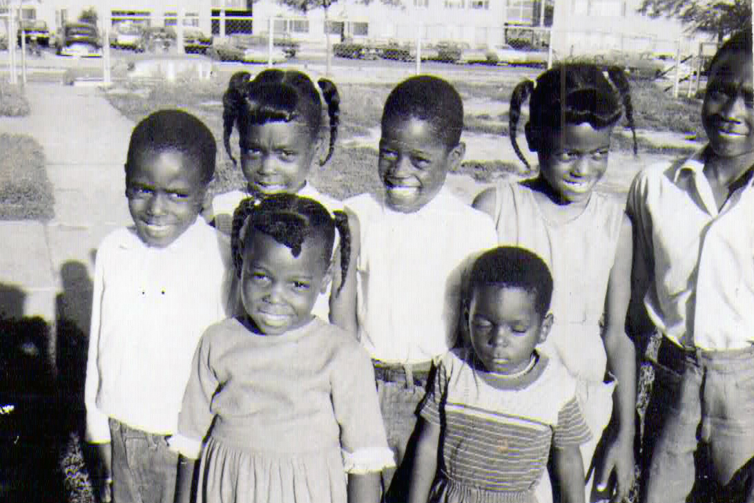 Christine's children with their cousin Kenny.
